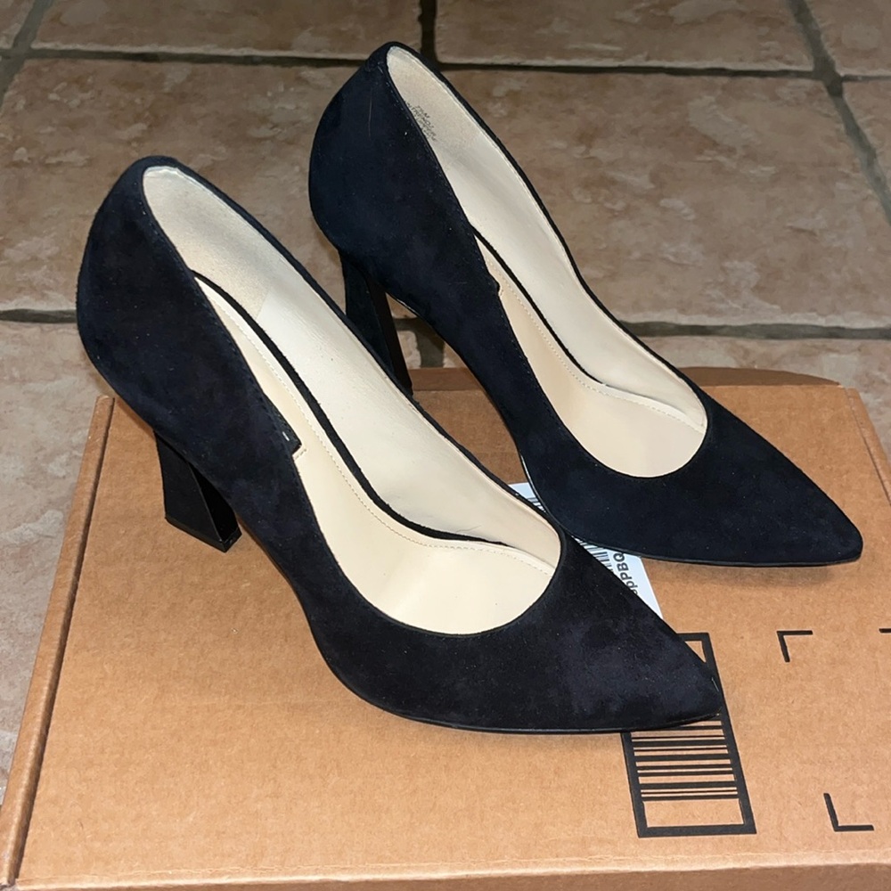 Black suede Nine West heels. Size 7.5 never worn outside.